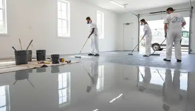 Professional epoxy floor coating in a Knoxville, TN garage by local painting experts