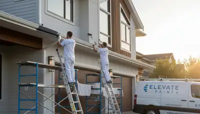 Professional gutter painting on Knoxville, TN home exterior by expert house painters