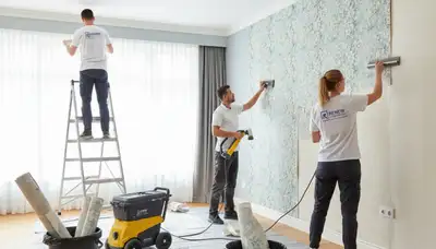 Professional wallpaper removal in Knoxville TN home by expert painters ensuring clean wall finish